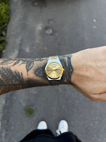 CASIO QUARTZ DAYDATE SILVER GOLD