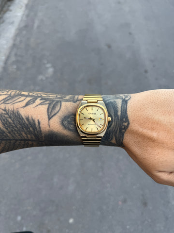 CASIO QUARTZ AQ DOURADO