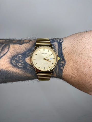 CASIO QUARTZ REDONDO DOURADO