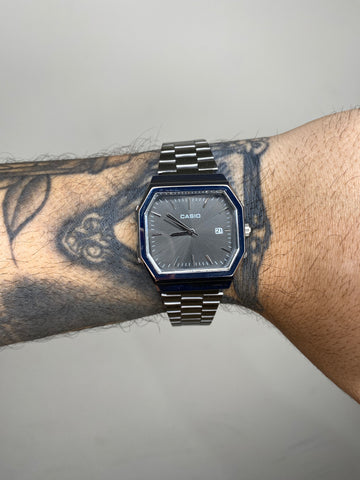 CASIO QUARTZ OCTA PRATA FUNDO PRETO