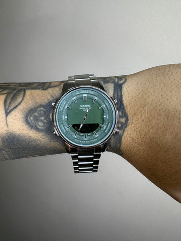 CASIO AMW PRATEADO FUNDO VERDE