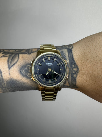 CASIO AMW DOURADO FUNDO PRETO