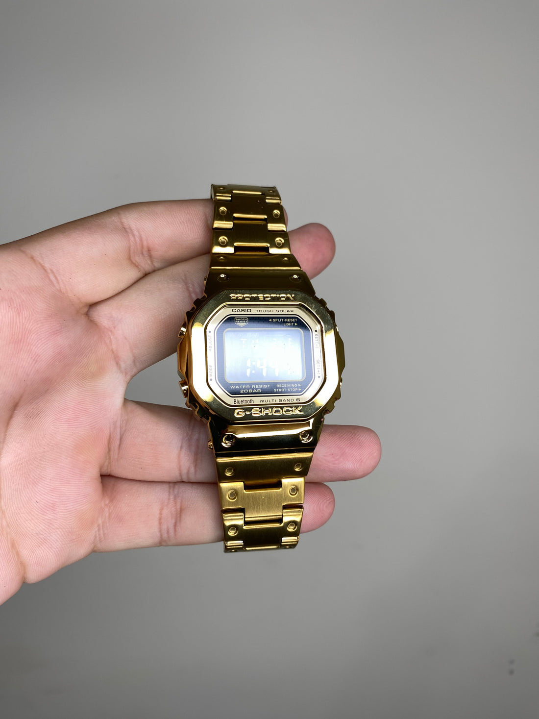 G-SHOCK DW-5600 AÇO DOURADO