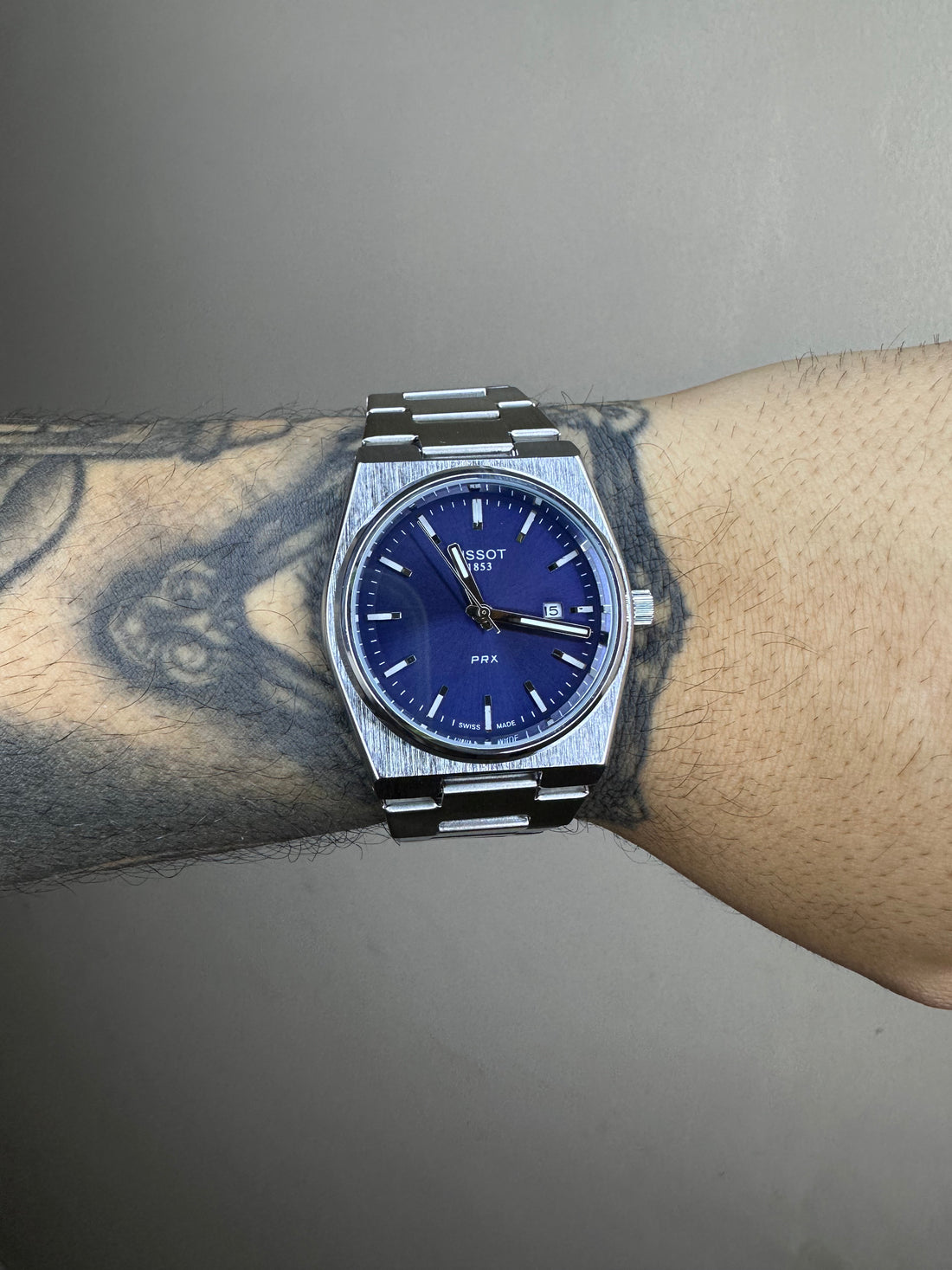 TISSOT PRX PRATEADO FUNDO AZUL