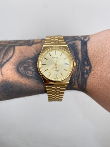 CASIO QUARTZ MTP DOURADO