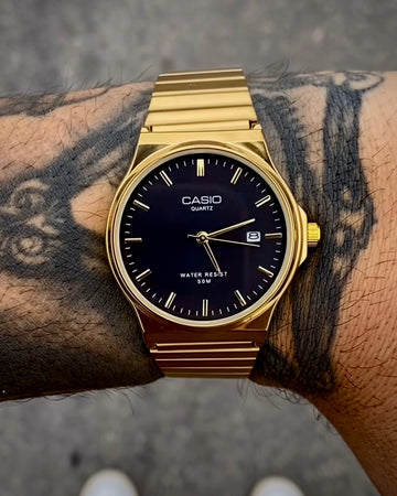 CASIO QUARTZ REDONDO DOURADO FUNDO PRETO