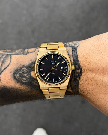 TISSOT PRX DOURADO FUNDO PRETO